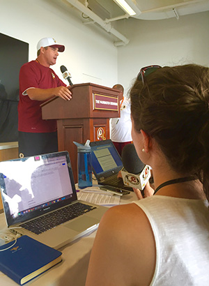 Spencer attends a press conference with Washington Redskins Head Coach Jay Gruden.