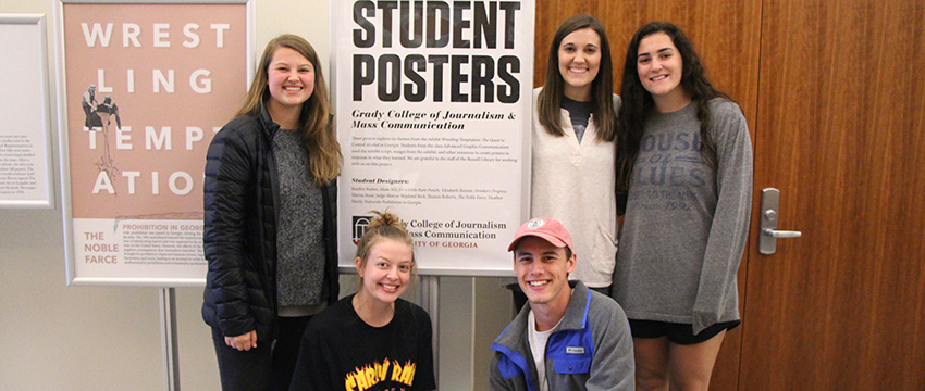 Students from Kristen Smith's Advanced Graphic Communication course view their work on display at the Special Collections Libraries.