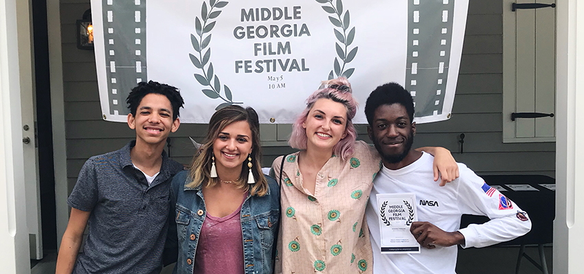 Braxton Jordan, Paige Marogil, Caitlin Guffin, and Jamaal Johnson accepted an award for Best College Story in the 2018 Middle Georgia Film Festival.