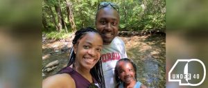 Jamelia Outlaw Smith and her family hiking on a trail together