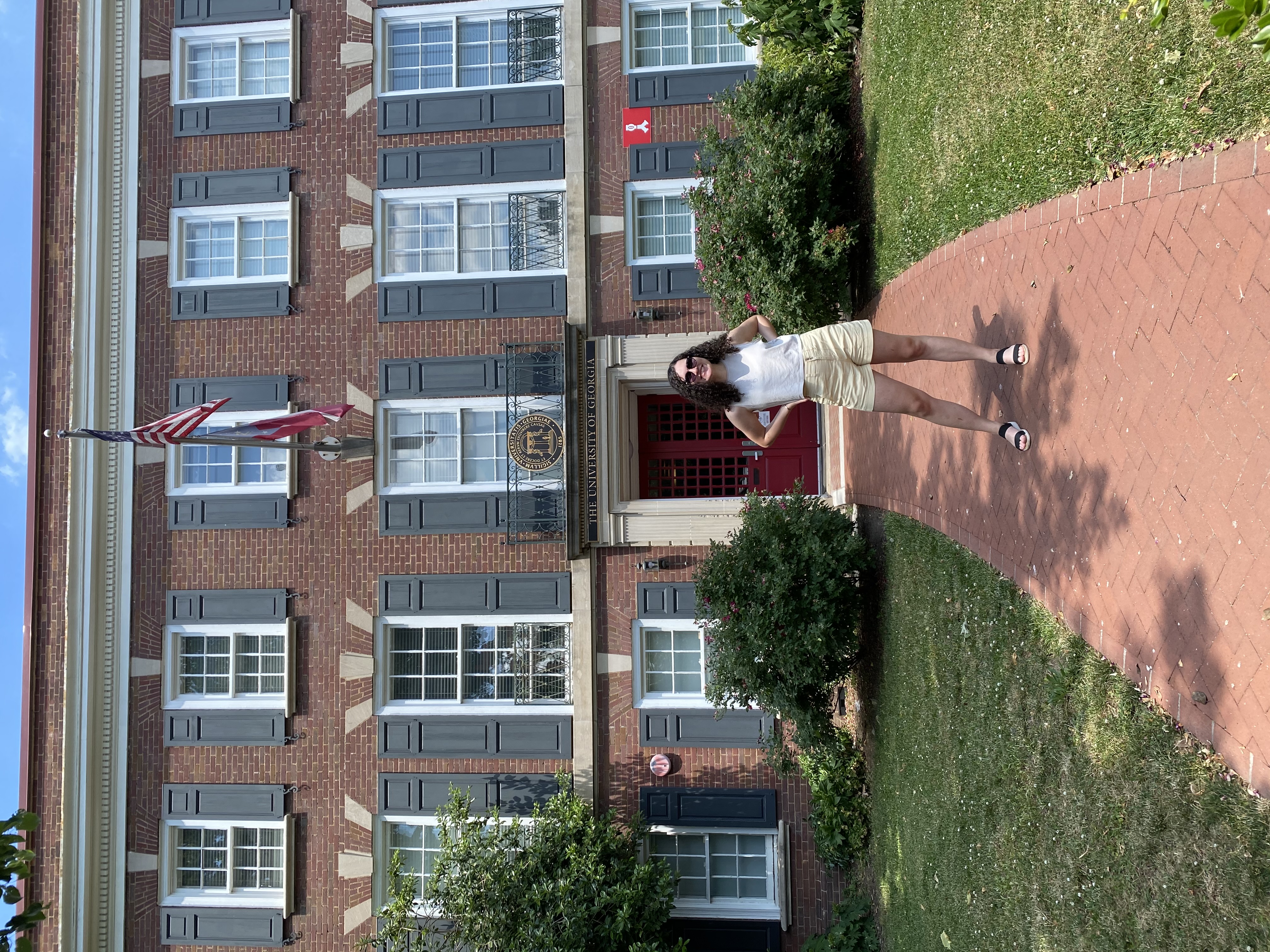 Pysczynski posing outside Delta Hall