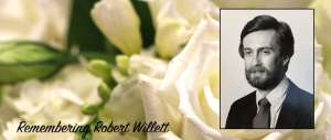 Remembrance roses and headshot of Robert Willett