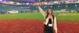 Katherine Lewis on the field after the Orange Bowl
