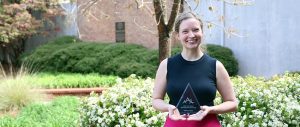 Glenna Read poses with her AAA Promising Professor Award