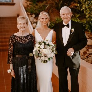 A picture of Vivien Houghton, Kimmie Wilson and Bob Houghton at Kimmie's wedding in 2022.