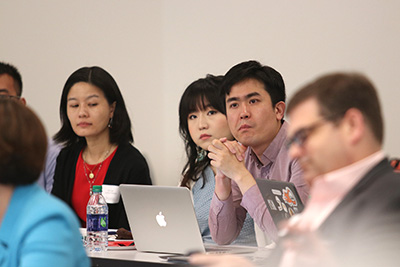 A group of students listen intently to a Crisis Communication Think Tank speaker