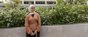 Mennah Abdelwahab stands in front of Grady College.