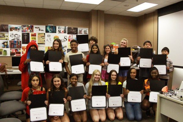 Students in the AdPR Summer Academy posed for a photo with their certificates following their final presentations.