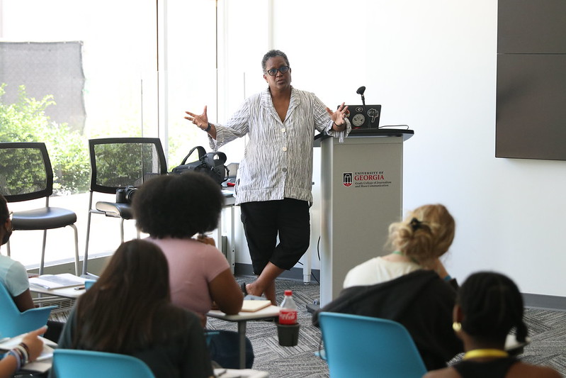 Akili-Casundria Ramsess of NPPA talks with students attending the Journalism Summer Camp.