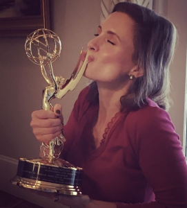 Johnson kissing her Emmy award