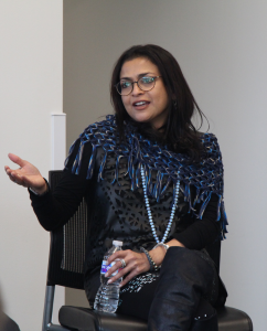 Basu speaks during a panel at Grady College in 2018.