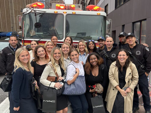 Public Relations students in front of an NYC fire truck.