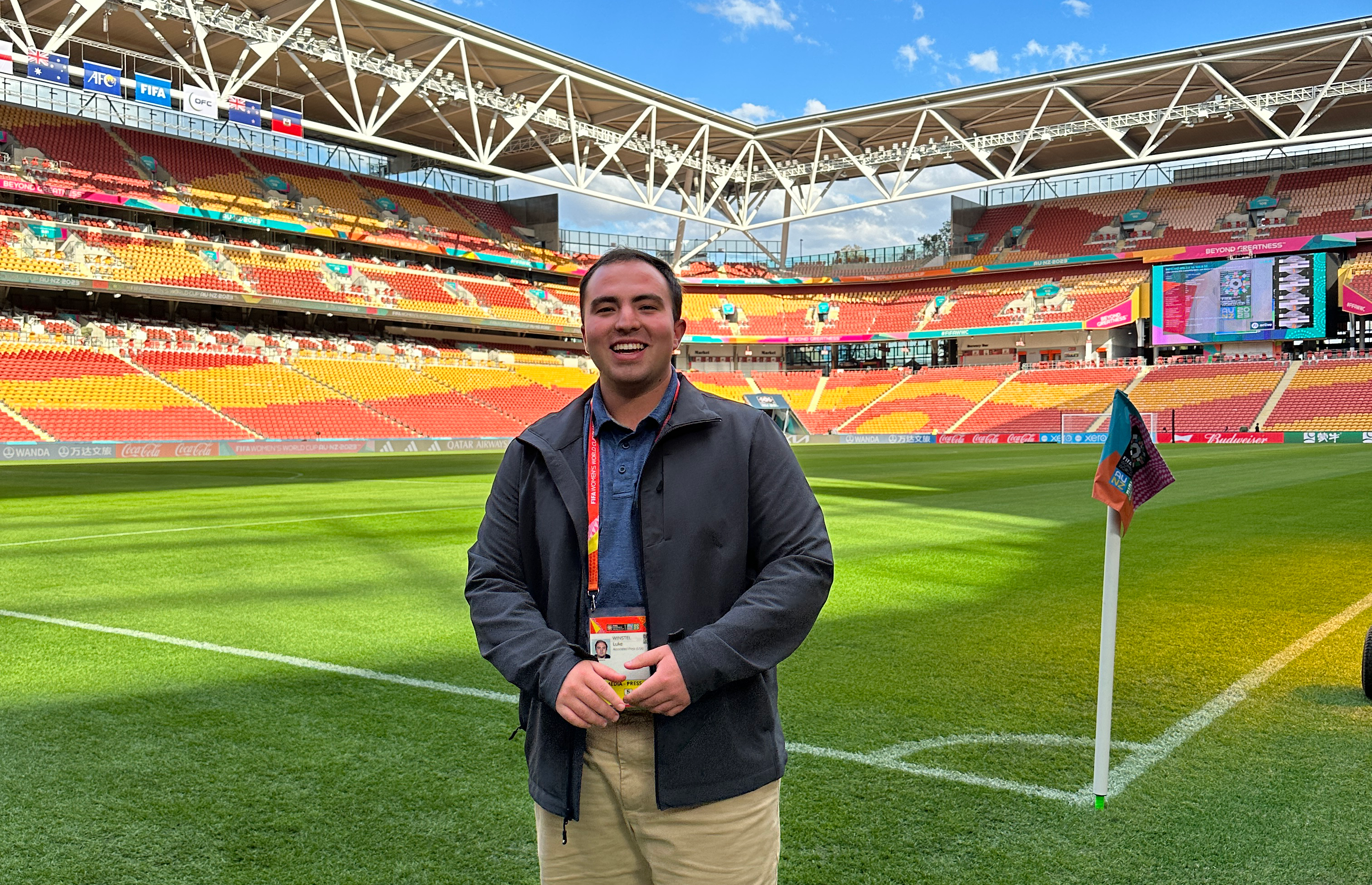 Luke Winstel stands on a Women's World Cup soccer field