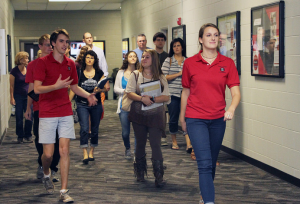 Prospective students walk through the halls of Grady College