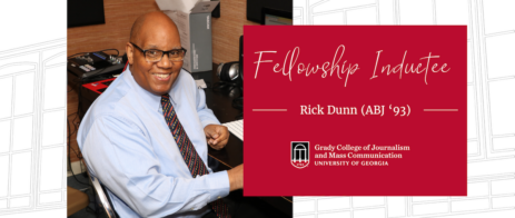 A slider graphic with a photo of Rick Dunn sitting at a desk. The text reads, "Fellowship Inductee Rick Dunn (ABJ '93).