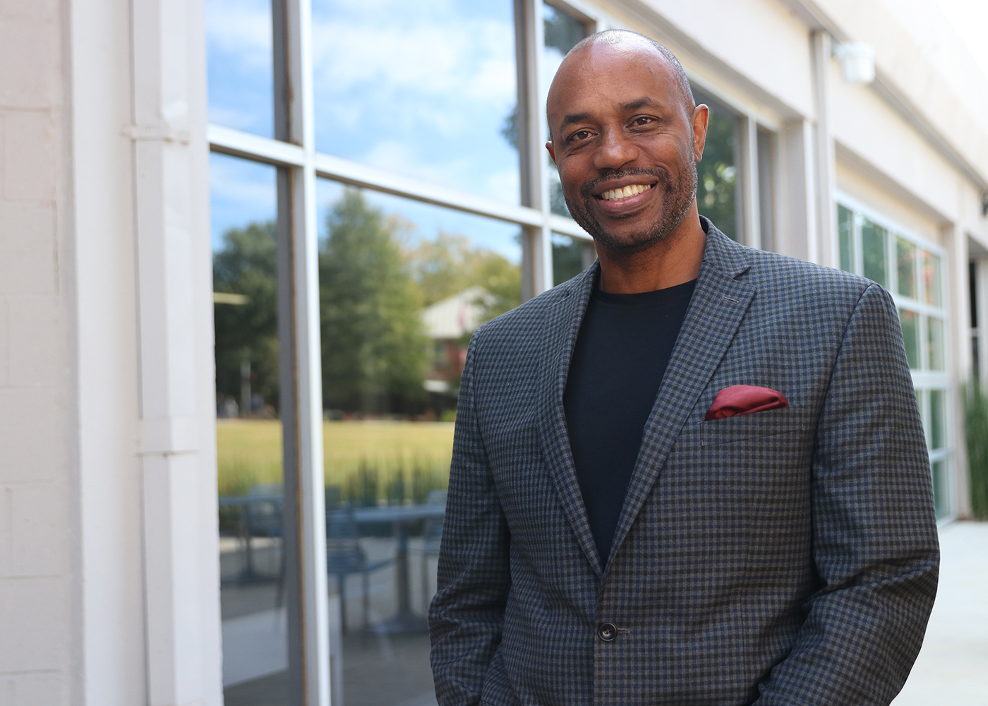 Environmental picture of Nick Chiles with Grady College in the background.