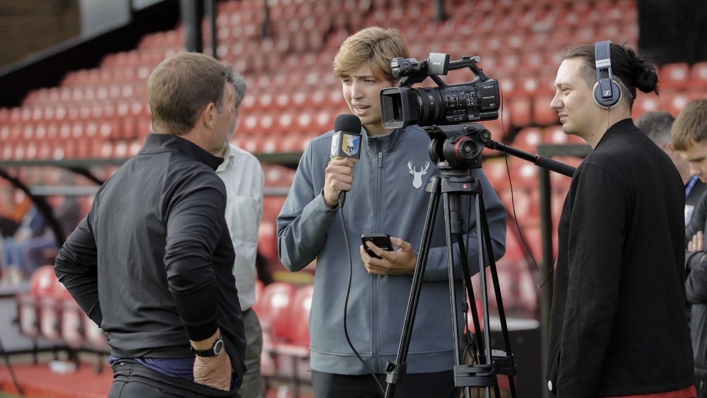 Jack Little interviewing manager of team.