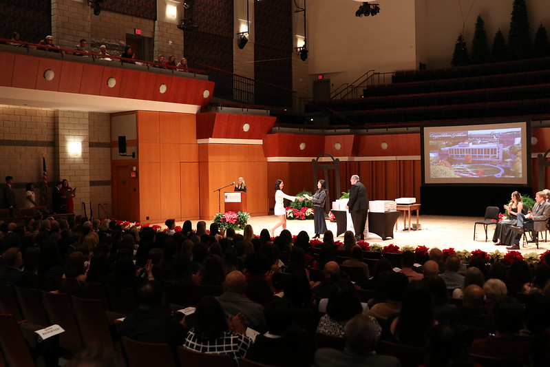 A wide angle shot of the stage at Fall Convocation