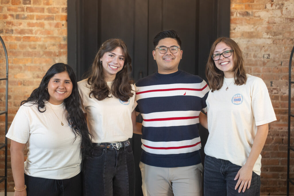 Ally Kramer poses with presenter prep team at TEDxUGA presenter welcome brunch.