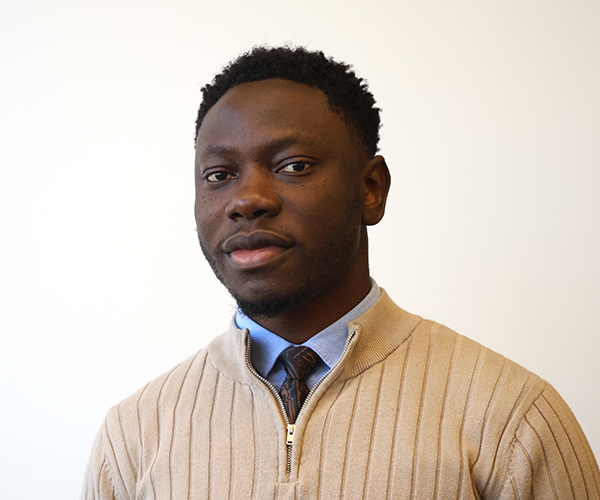 Headshot of Moses Okocha