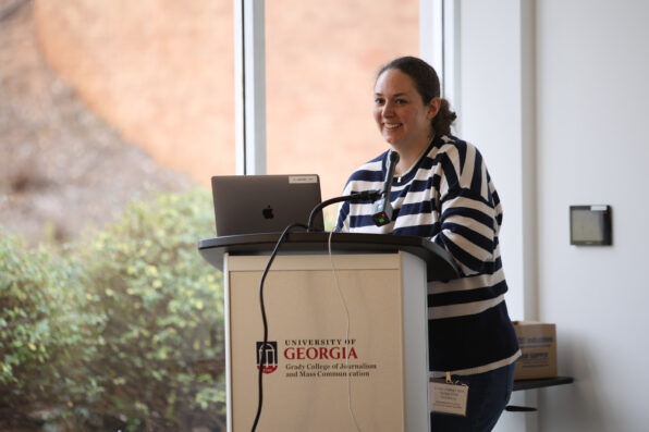 Sam Bresnahan speaks at a lectern.