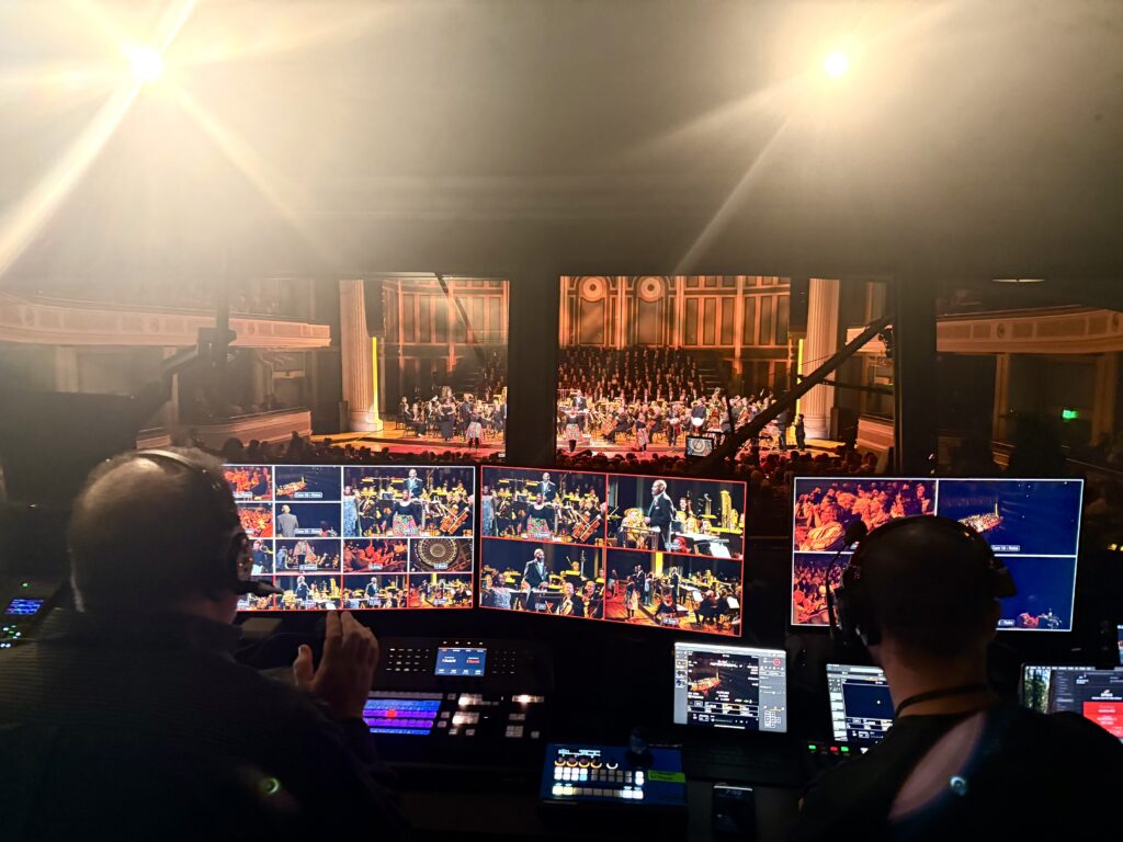 A first person point-of-view look at a live music recording studio.