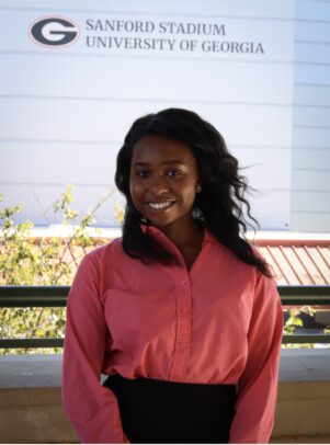 A young woman poses for a headshot.