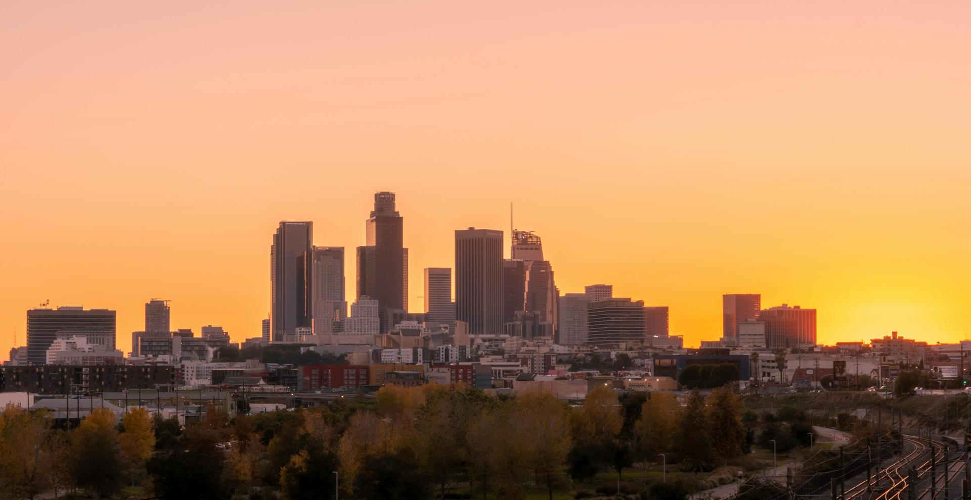 An image of the Los Angeles skyline at dusk.