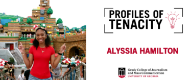 Standard white Profiles of Tenacity header graphic with text: Alyssia Hamilton. To the left is a picture of Hamilton smiling in front of Super Ninendo World at Universal Studios.