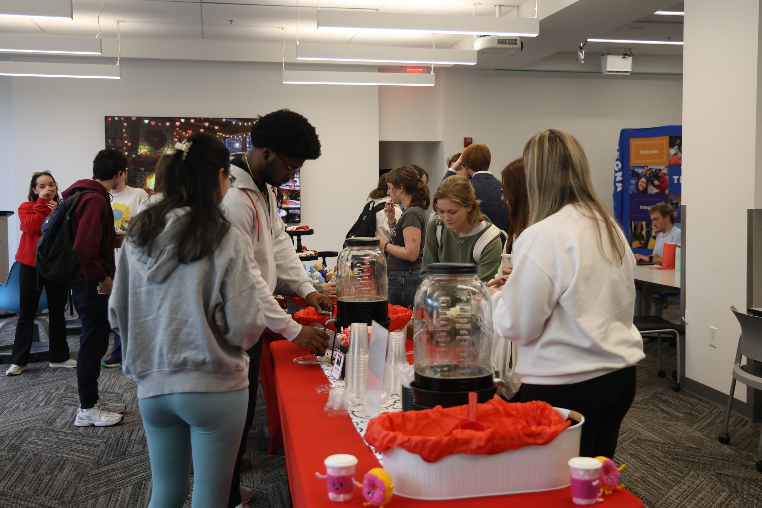 A group of students grabbing ice coffee.