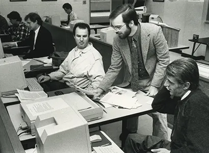 An undated picture of Barry Hollander addressing a group of international journalists.