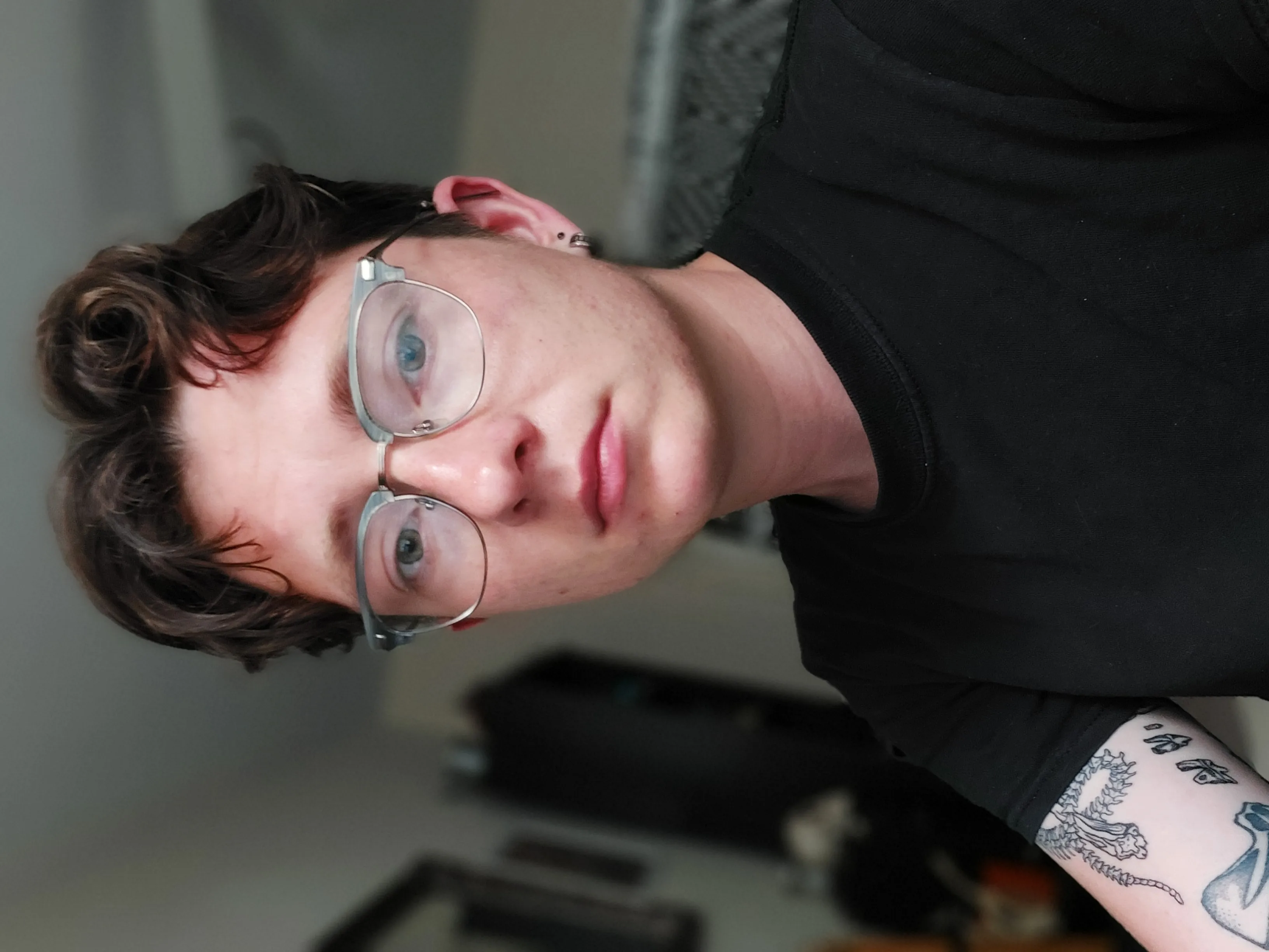 selfie of student Alex Anteau, working from home.