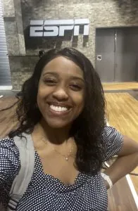 student selfie in front of ESPN logo