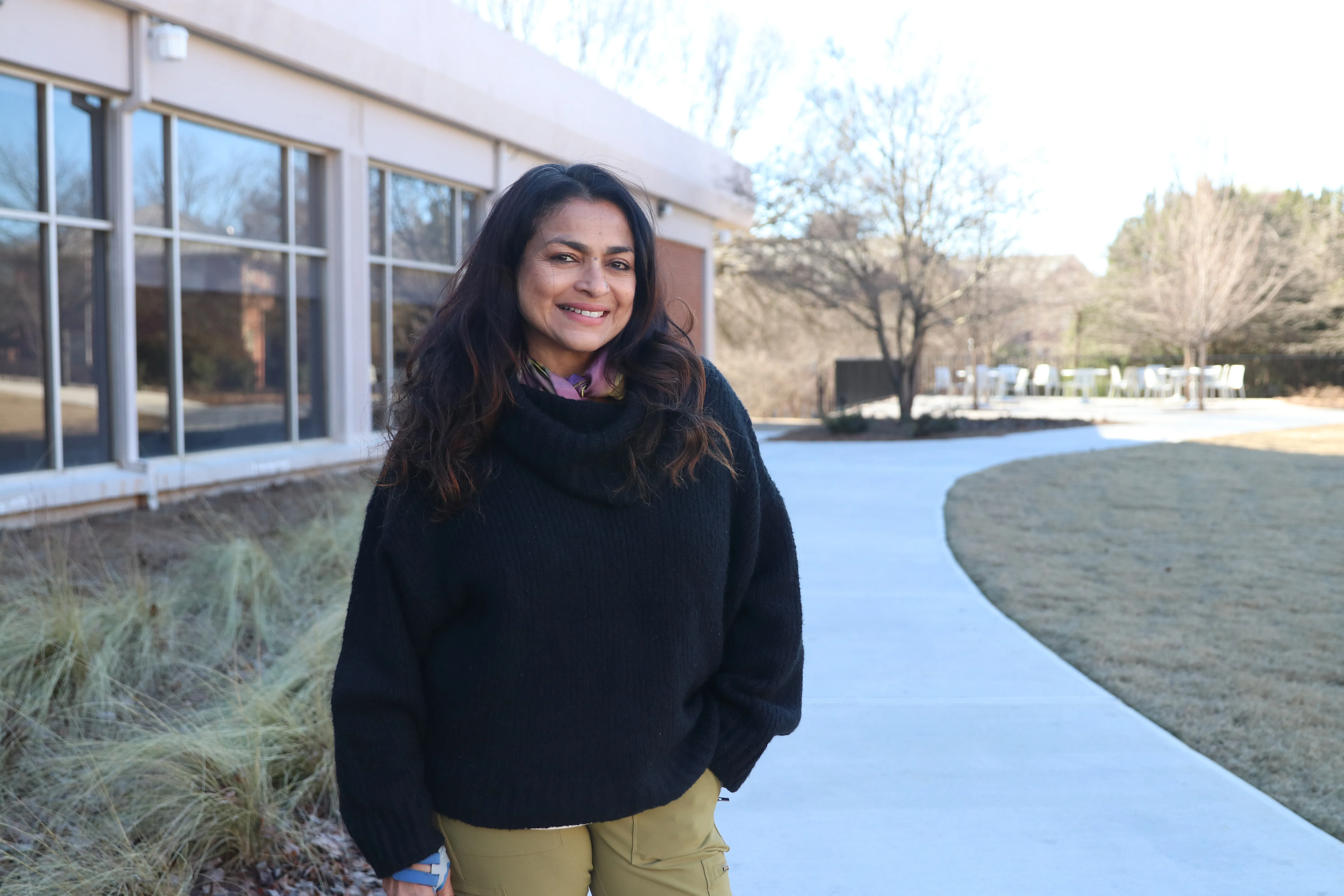A photo of Moni Basu outside of Grady College.