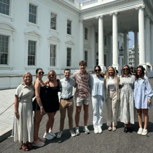 Students stand in front of the White House