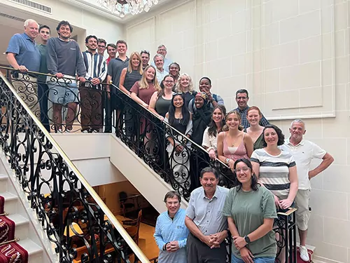 Students and crew on a stairs.