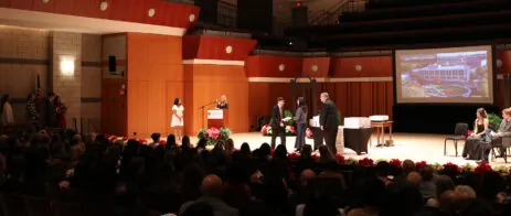 Students cross the stage during Convocation.