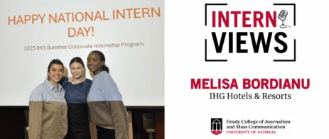 Three young women stand smiling in front of a screen displaying “HAPPY NATIONAL INTERN DAY! 2025 IHG Summer Corporate Internship Program.” Next to them are graphics reading “Intern Views: Melisa Bordianu, IHG Hotels & Resorts.”.