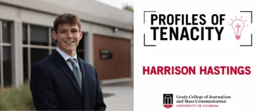 Harrison Hastings smiles for headshot at Schnitzer Family Lawn.