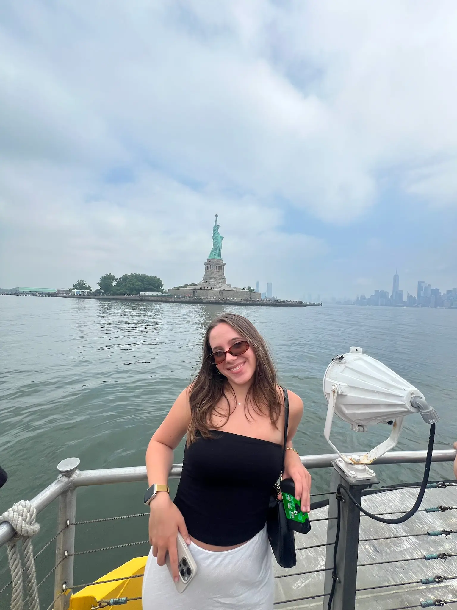 Anna in front of Statue of Liberty
