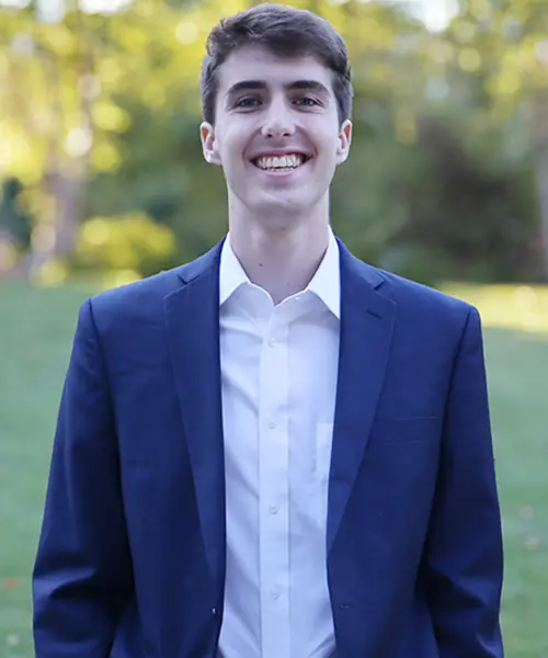 A young man, Carter McGraw, poses for a headshot photo.