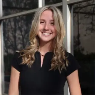 Alexia Rule smiles in a headshot.