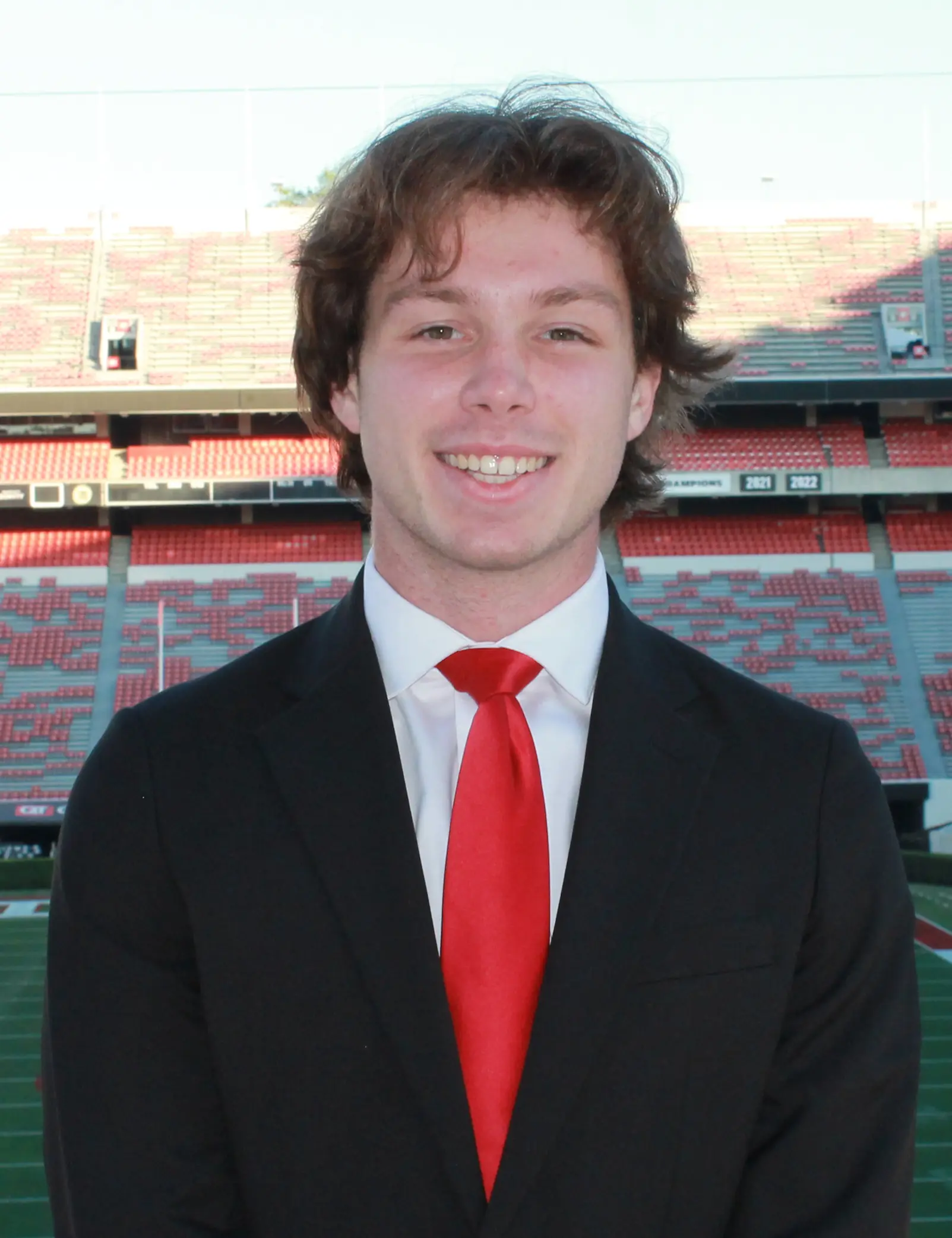Headshot of Ryan Taormina overlooking Sanford Stadium